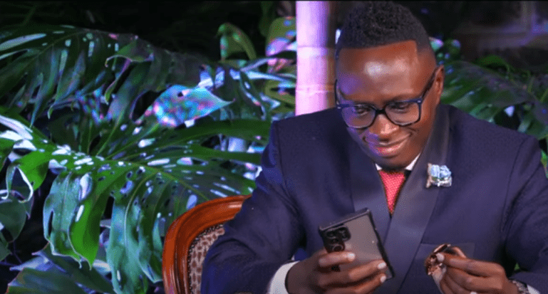 Obinna examines Oscar Sudi's startling $128,000 watch. Picture/Courtesy