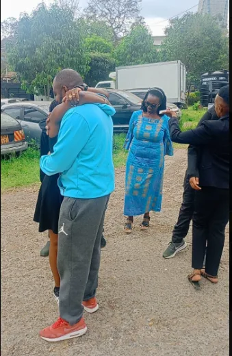 Boniface Mwangi Walks Out of Kamukunji Police Station After Sunday Arrest. Boniface Mwangi meets his wife outside Kamukunji Police Station. Picture/X